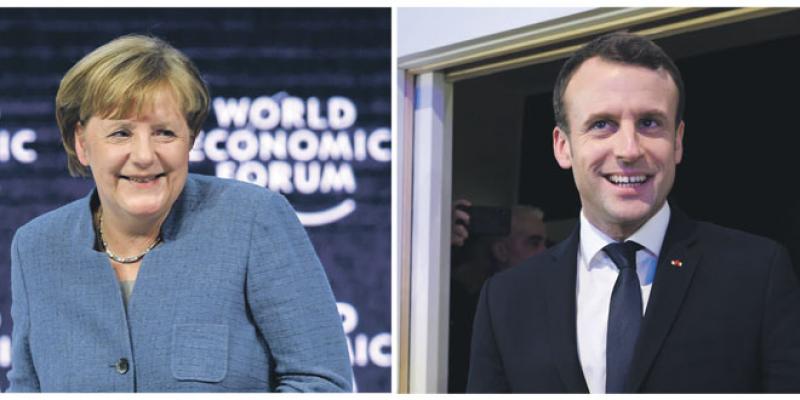 Forum de Davos: Merkel et Macron en vedette
