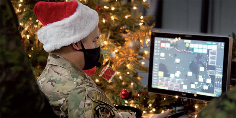 Le père Noël suivi par l’armée américaine